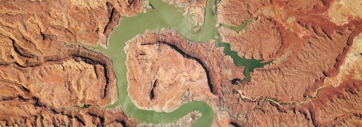 Erosion, tectonic uplift, and a human-built dam have all helped shape the Upper Lake Powell area in Utah.