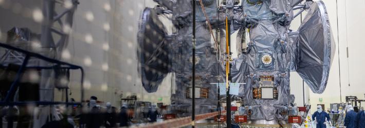 Technicians move NASA’s Europa Clipper spacecraft inside the Payload Hazardous Servicing Facility to accommodate installation of its five-panel solar array at the agency’s Kennedy Space Center in Florida.