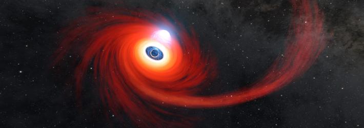 Against a black background dotted with stars, a disk of hot red gas swirls around a black hole in this illustration. There is a long stream of hot gas extending out to the right, which is feeding into the disk, and a bright cloud of plasma hovering just above the center of the black hole.